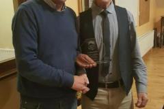 Bernard-Cumiskey-2017-Chairperson-presenting-plaque-to-outing-Chairman-of-Bord-na-nOg-Sean-Canning